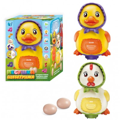 Музыкальная курочка 32772 "WToys", 2 цвета,, песня, подсветка, колесо свободного хода, несет яйца, в коробке